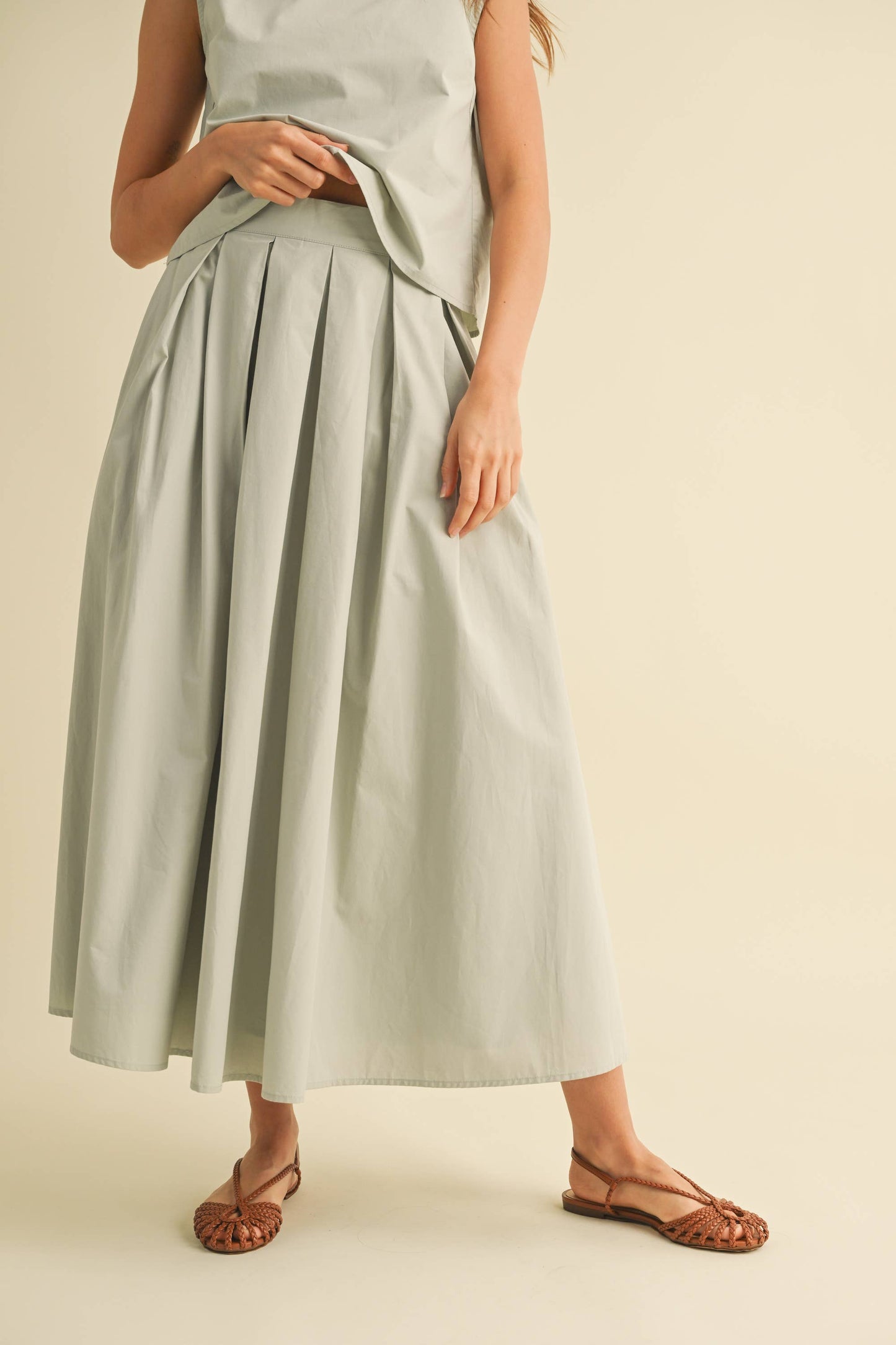 Sleeveless Top and Pleated Midi Skirt Set