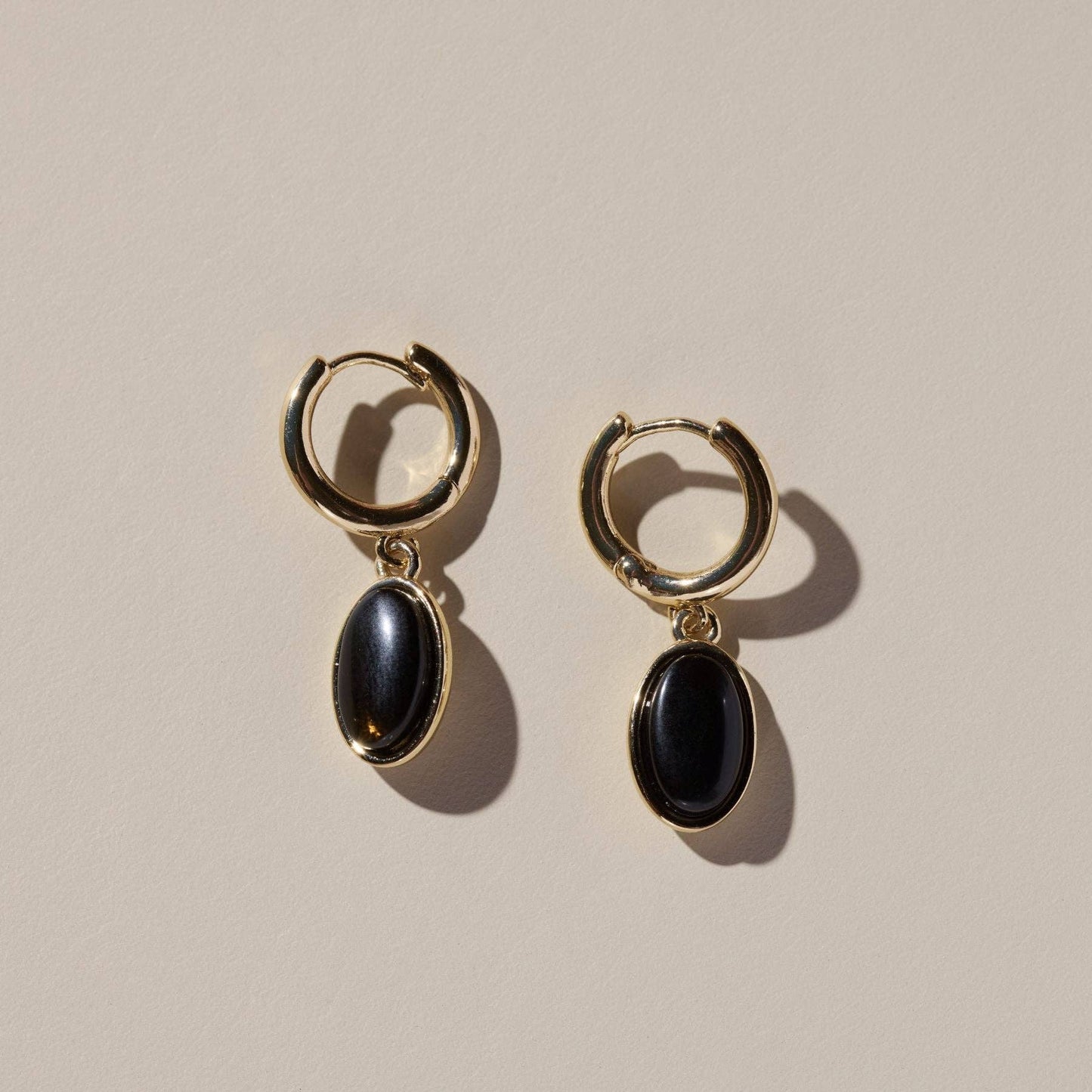 Nickel & Suede Black Oval Stone Huggies