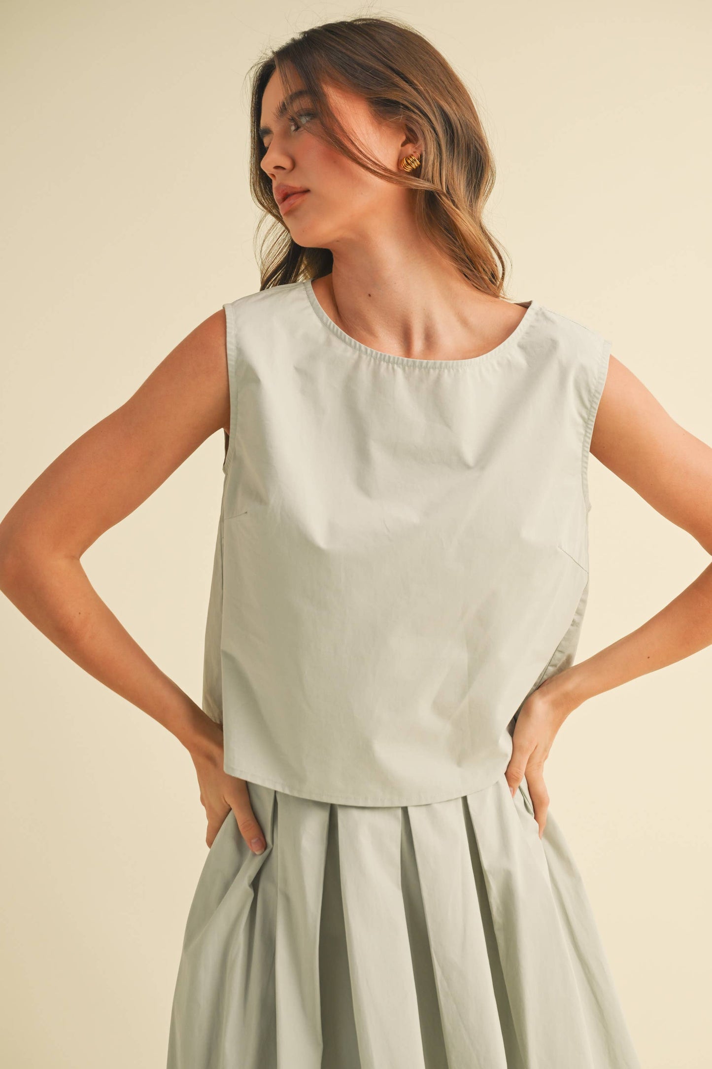 Sleeveless Top and Pleated Midi Skirt Set