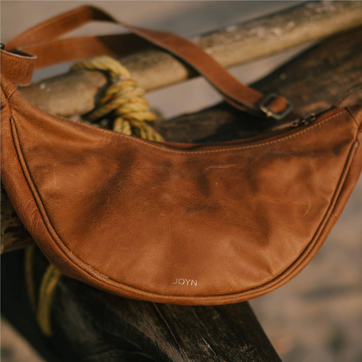 Leather Moon Sling Bag - in Camel