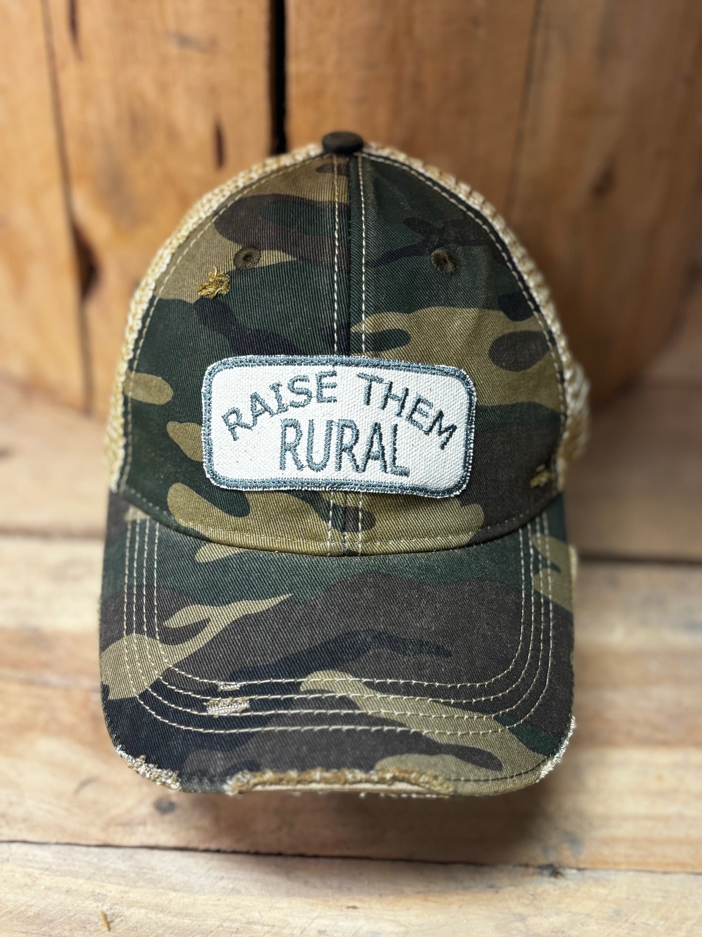 Raise Them Rural Distressed Trucker Hat