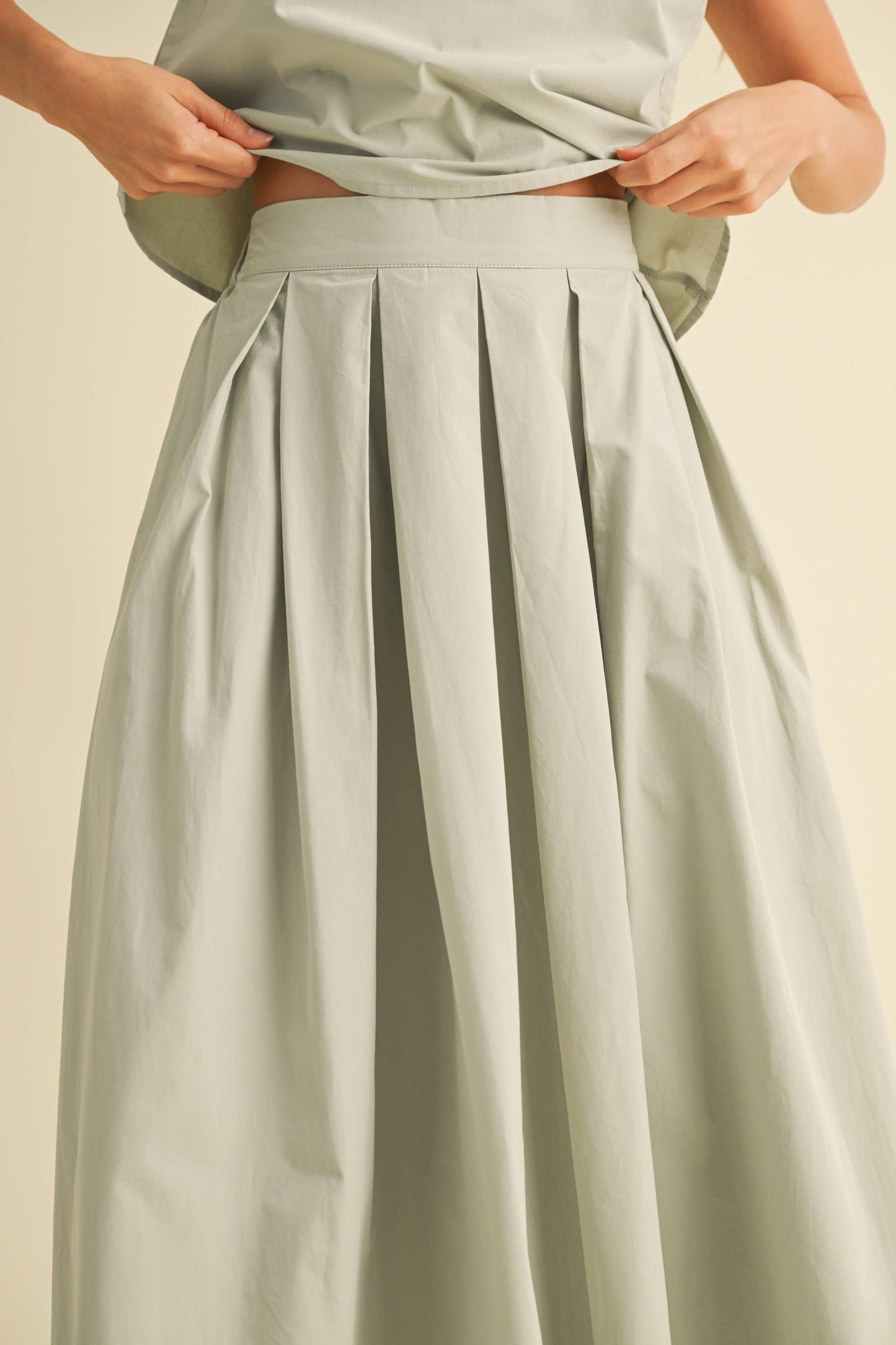 Sleeveless Top and Pleated Midi Skirt Set