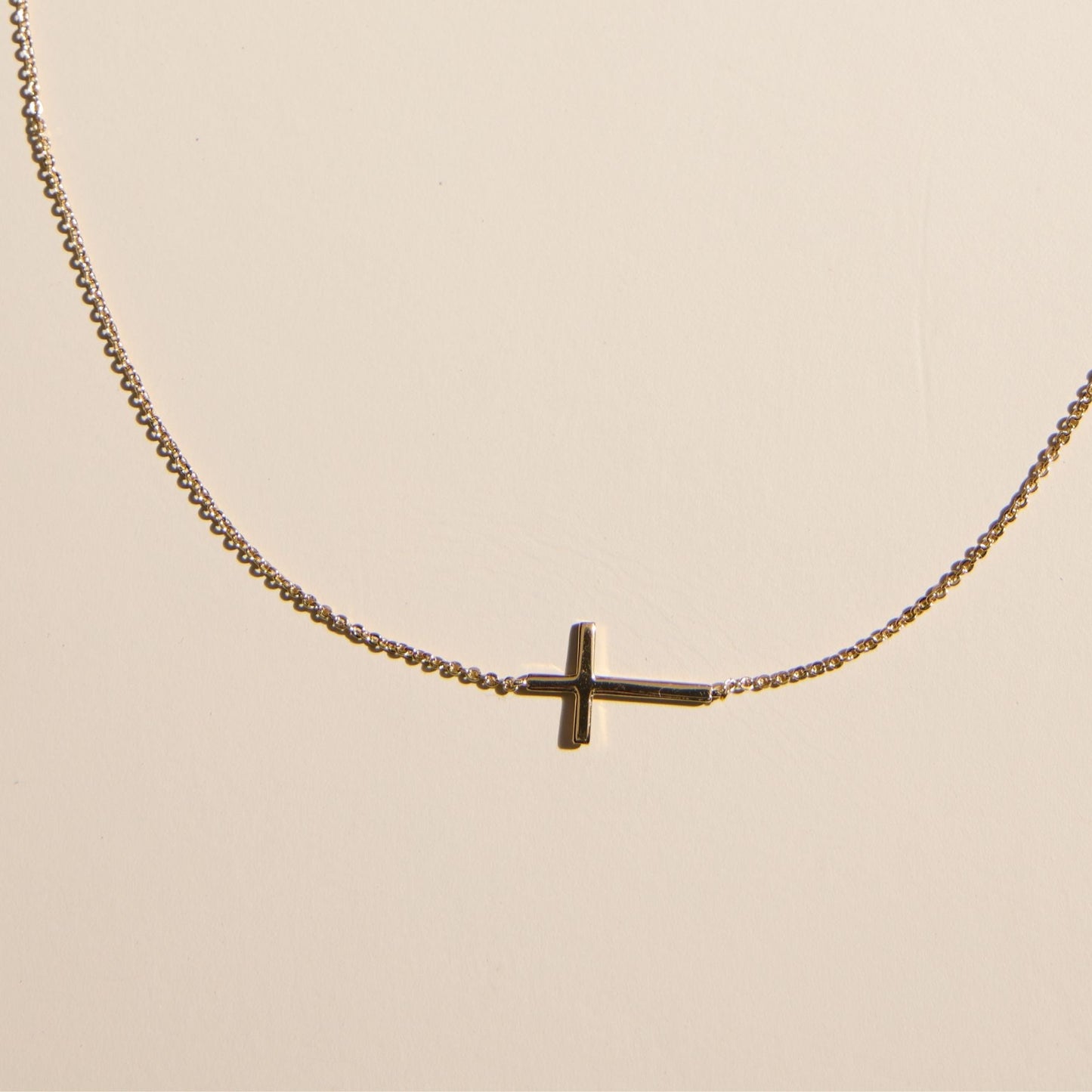 Gold Sideways Cross Necklace